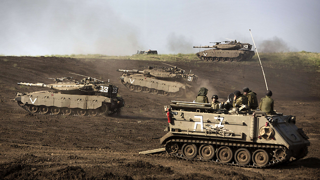 IDF tanks on the Golan Heights (Photo: AFP/File) IDF tanks on the Golan Heights (Photo: AFP/File)