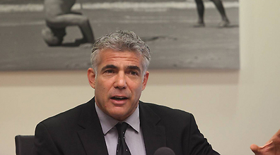 Finance Minister Yair Lapid (Photo: Gil Yohanan)