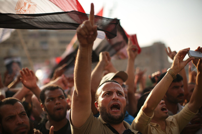 Muslim Brotherhood supporters protest in support of Morsi in Egyptng after government takeover by al-Sisi. (Photo: Getty Images)