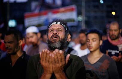 Pro-Morsi supporters in Cairo (Photo: Reuters)