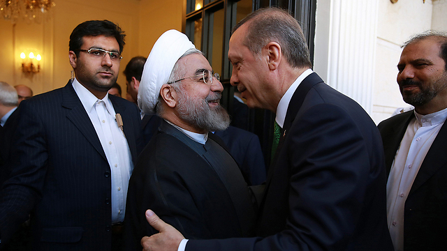 Iran's President Rouhani, left, welcomes Turkey's President Erdogan to Tehran (Photo: AP)