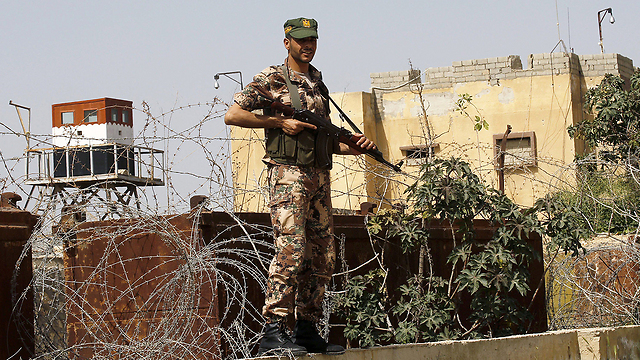 Hamas fighter on Gaza-Sinai border (Photo: AFP)