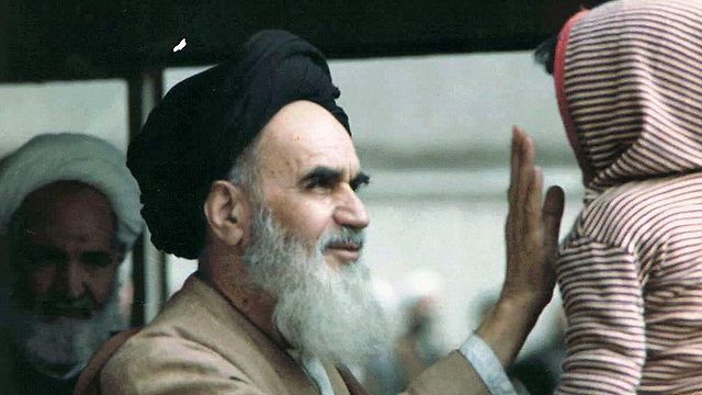 Ayatollah Ruhollah Khomeini, who supported violent revolution 