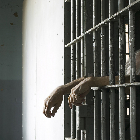 One of the interrogated prisoners: "I asked myself if I am alive or if I was dead" (Photo illustration: Shutterstock)