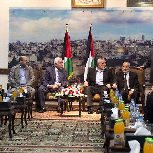 Fatah and Hamas delegations meet in Gaza (Photo: AFP)