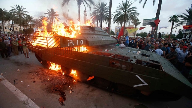 The Israeli tank on fire in Sidon
