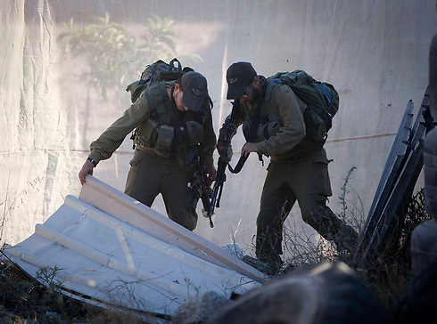 Search efforts in Hebron (Photo: AP)