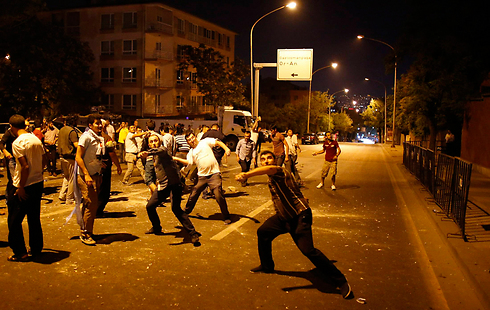 Rocks on consulate (Photo: Reuters) 