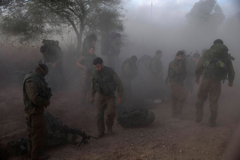Troops outside the Gaza Strip (Photo: Reuters)
