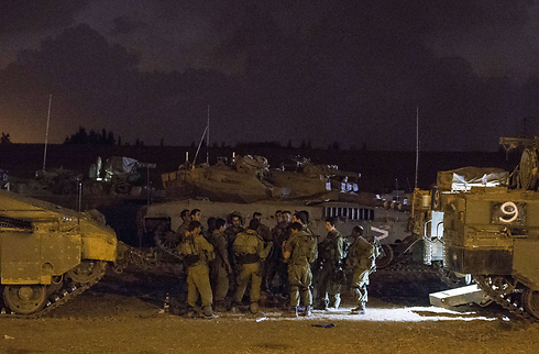 Forces outside Gaza (Photo: AFP)