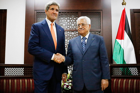 US Secretary of State John Kerry and Palestinian President Mahmoud Abbas