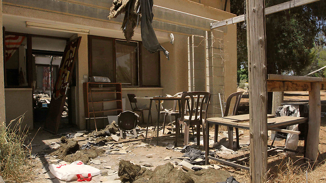Damage sustained to house next door (Photo: Ido Erez)