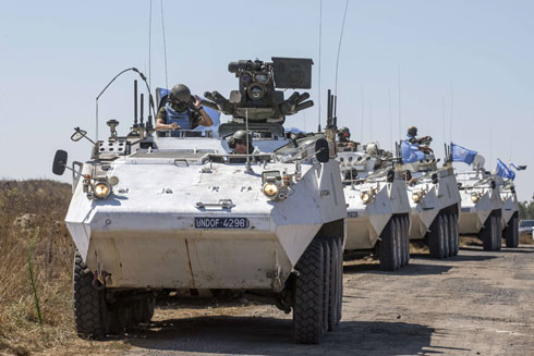 Filipino UN peacekeepers crossing the border from Syria to Israel (Photo: AFP)