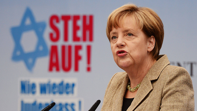 German Chancellor Merkel at a rally against anti-Semitism. Only a quarter of German population believes the EU should intensify activity on the subject (Photo: AFP)