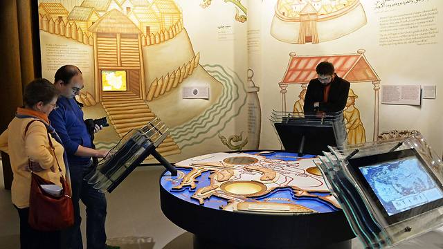 Visitors discover an exhibition in the Museum of the History of Polish Jews (Photo: AFP)