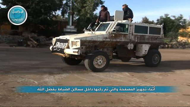 The Al-Nusra Front using the UN vehicle for the attack. (Photo: Twitter)