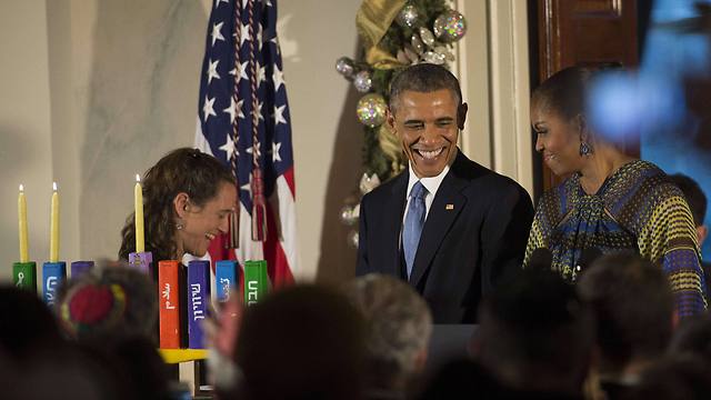 Barack and Michelle Obama at the White House Hanukkah party (Photo: AFP)