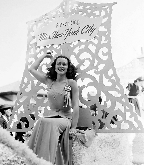 Bess Myerson waves from the float during a parade prior to competing in the Miss America pageant (Photo: AP)