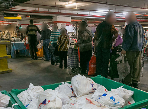 Food distribution for the poor (Photo: Ido Erez)