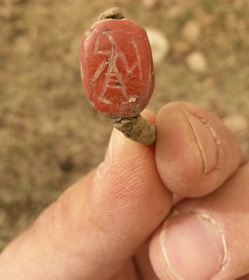 A ring that was discovered in the excavation which is inlaid with a seal depicting an Egyptian warrior holding a shield and sword (Photo: IAA)