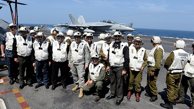 IDF offiers pose for picture with US Navy personnel.