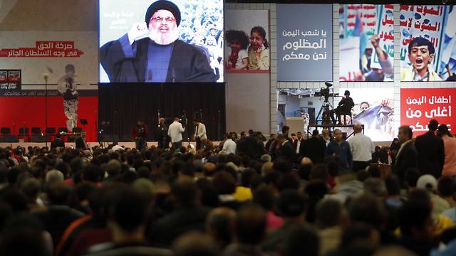 Hezbollah leader Sheikh Hassan Nasrallah, speaks via video link to his supporters during a rally titled 'in solidarity with oppressed Yemen' (Photo: AP)