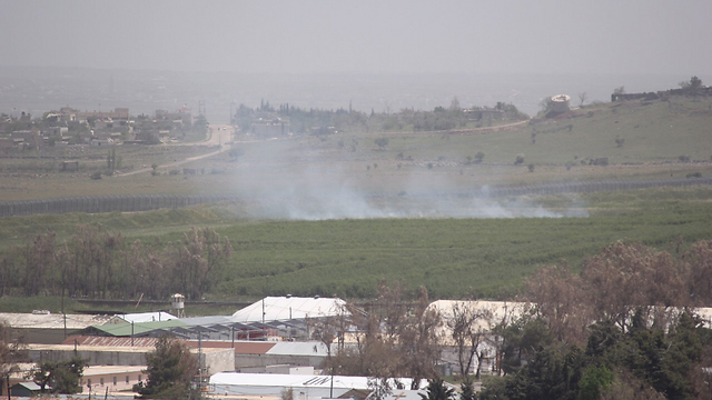 Shells fired in Syria falling on the Israeli side of the border (Photo: Eli Segel)