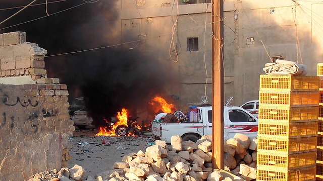 The flames of war in Ramadi. (Photo: Reuters)