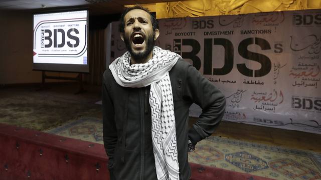 Boycott supporter at BDS event (Photo: AP)