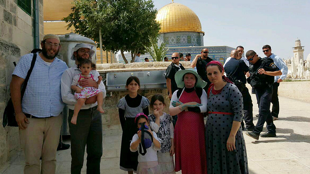 Ayla (in the red dress) with her family on the Temple Mount (Photo: Gilad Harari)