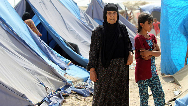 Iraqi refugees expelled from their homes in Ramadi. (Photo: AFP)