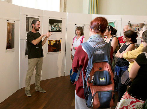 Breaking the Silence photo exhibition. Although they are lying, the organization's activist have no problem to operate freely in the State of Israel (Photo: Reuters)