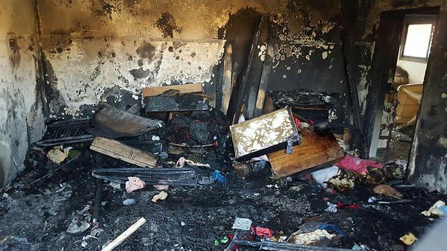 Destruction at the Dawabsheh family home in Duma (Photo: Zachariya Sada, Rabbis for Human Rights)