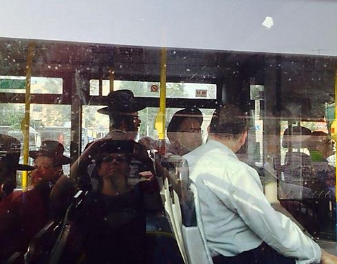 Haredi men on Egged bus. 'The boy began inciting all the other men, who backed everything he said'  
