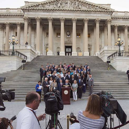 House representatives during a recent press conference in favor of the Iran deal outside of House chambers. (Photo: AFP)