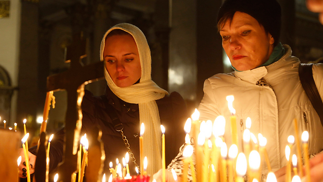 Relatives mourn victims at vigil (Photo: AP)