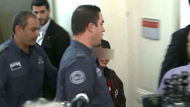 Muawiya Alqam, who carried out a stabbing on Jerusalem's light rail, in custody. (Photo: Ofer Meir)