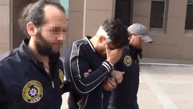 Boris Wolfman under arrest in Turkey.