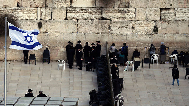 People in prayer at the Western Wall (Photo: AFP)