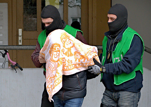 One of the arrested suspects, in Berlin. (Photo: EPA)