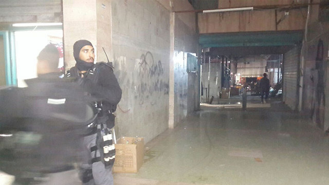 Police at the market in Rahat after the attack