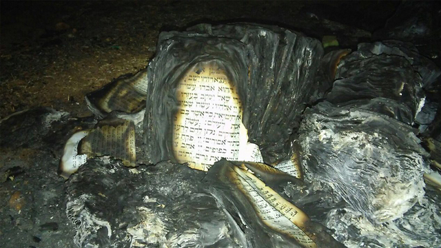 Burnt Torah book (Photo: Karmei Tzur Security)