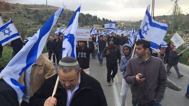 Hundreds march on bloody West Bank route, demanding more deterrence