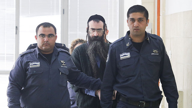 Shlissel escorted to court (Photo: Ehad Zwingerberg)