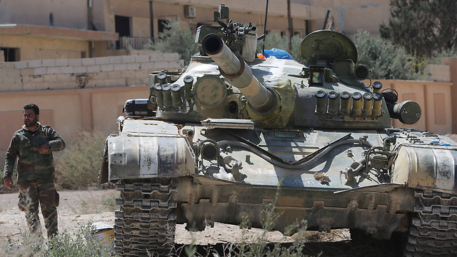 A Syrian tank in Homs (Photo: AFP)