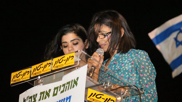 Elor's mother and sister speaking (Photo: Motti Kimchi)