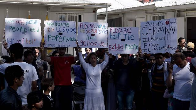 Yazidis demonstrating for the release of the captives (Photo: AFP)