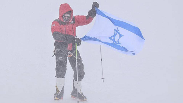 Nadav Ben Yehuda at the summit of Annapurna 1, the 10th highest mountain in the world