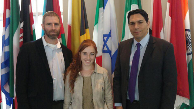 Natan Meir and his daughter with Israeli Ambassador to the UN Danny Dannon
