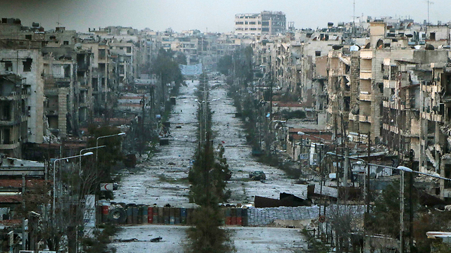 A destroyed street in Aleppo. Assad's actions have led to the deaths of about 400,000 people so far. (Photo: Reuters)